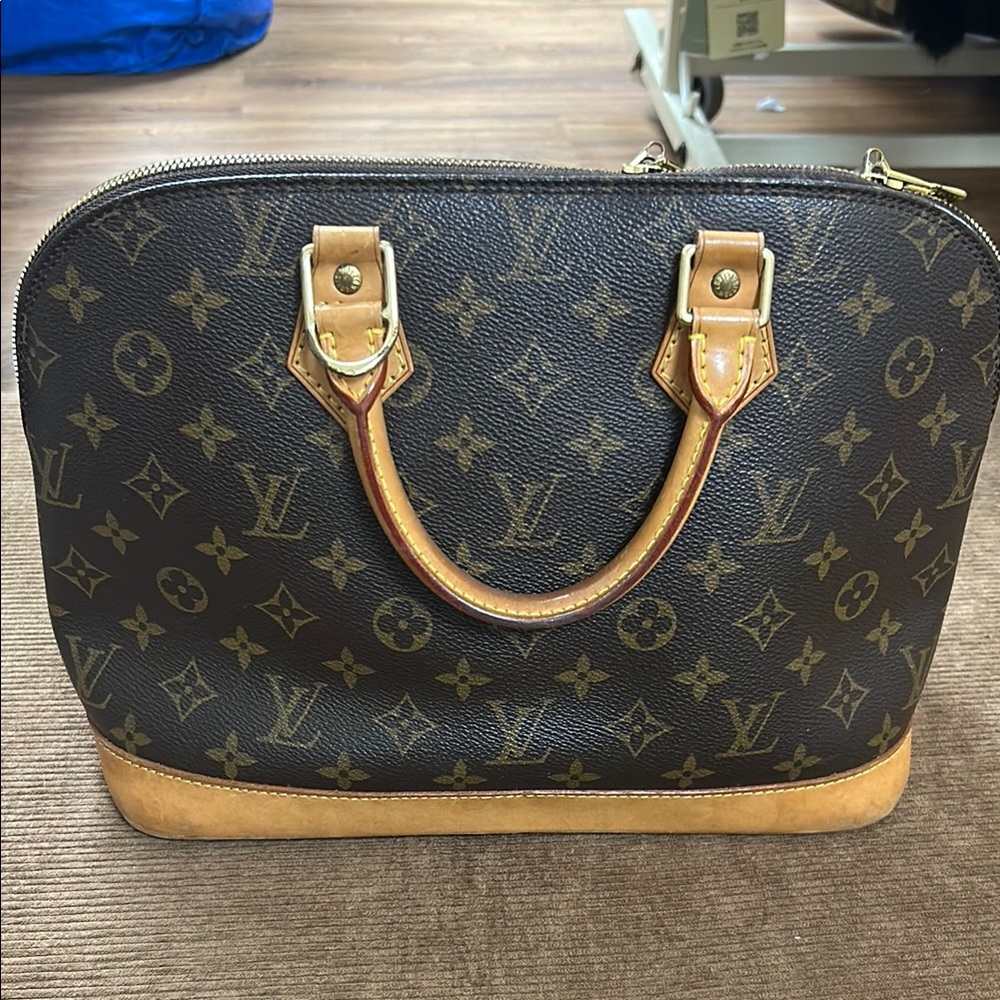 Louis Vuitton Alma PM Monogram Handbag